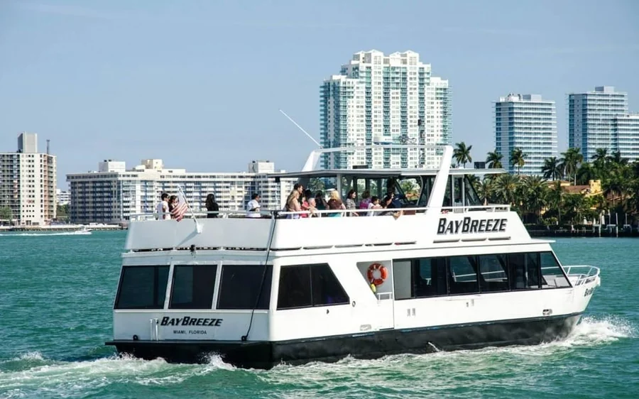 A boat passing celebrity homes on Biscayne Bay